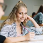 teenage student girl writing looking camera 23 2147666661